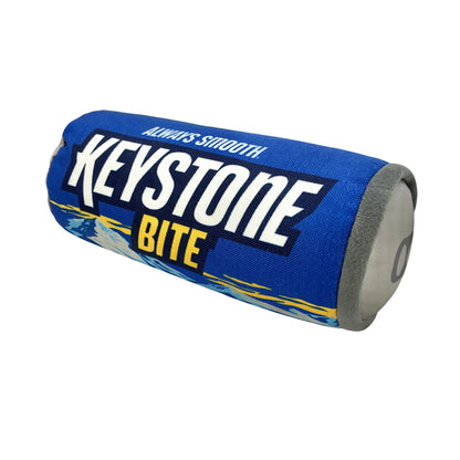 Blue cylindrical Keystone Bite dog toy with ‘Always Smooth’ branding, shown at an angled view.